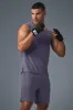 The Triumph Muscle Tank - Italian Plum sold by Alo Yoga