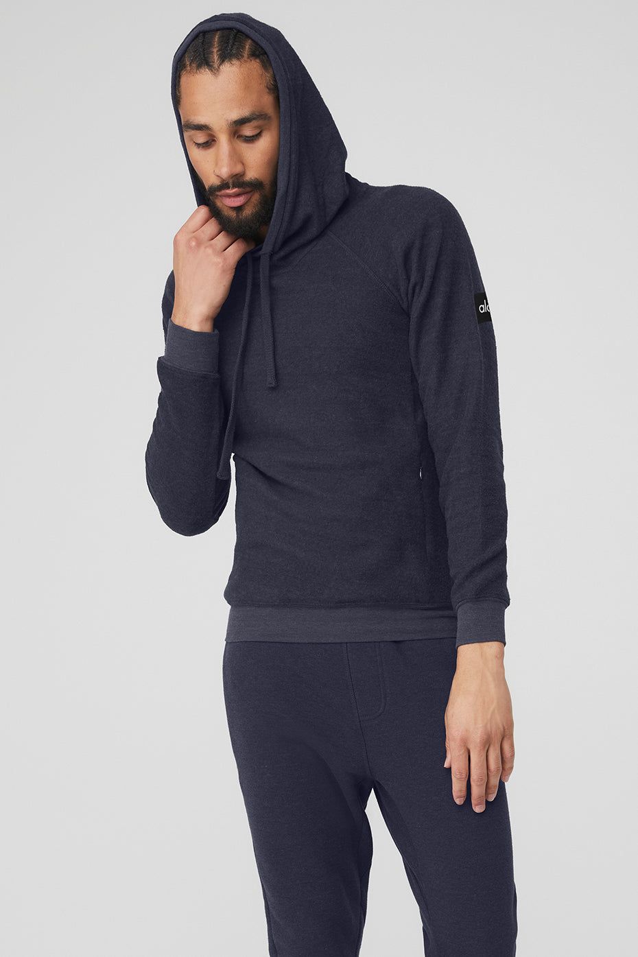 The Triumph Hoodie - True Navy sold by Alo Yoga