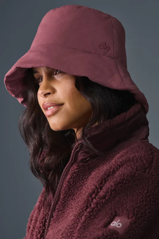 Good Shade Puffer Bucket Hat - Burgundy Truffle sold by Alo Yoga