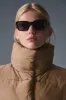 Cropped Gold Rush Puffer Vest - Toasted Almond sold by Alo Yoga