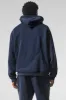 Make Waves Hoodie - Navy Tonal sold by Alo Yoga