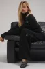 Winter Magic Cashmere Turtleneck - Black sold by Alo Yoga