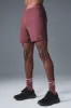 7" Conquer React Performance Short - Burgundy Truffle sold by Alo Yoga