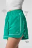 Motivate Track Short - Spruce Green/White sold by Alo Yoga