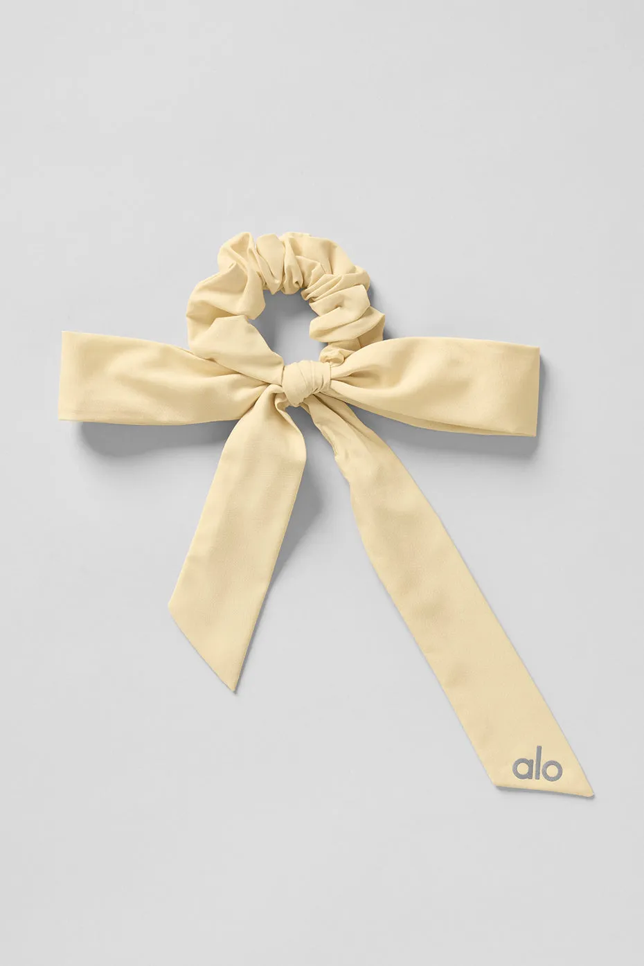 Love Knots Tie Scrunchie - Warm Butter sold by Alo Yoga