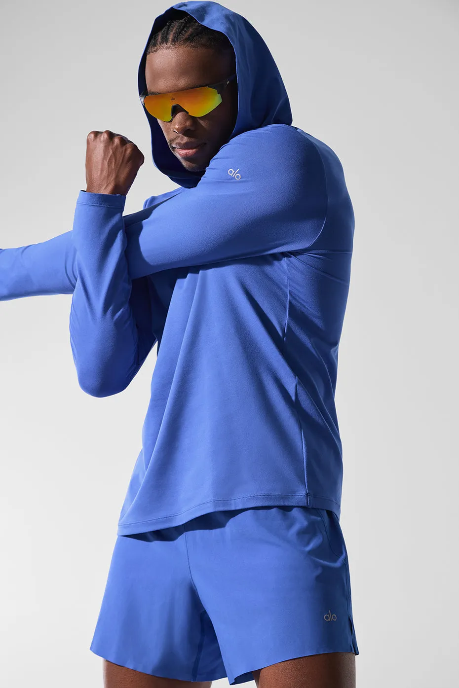Conquer Reform Long Sleeve With Hood - Marathon Blue sold by Alo Yoga
