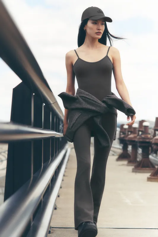 Airbrush Bootcut One And Done Onesie - Anthracite made by Alo Yoga