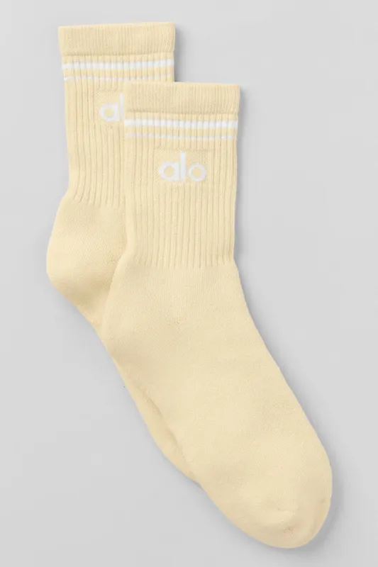 Unisex Half-Crew Throwback Sock - Candlelight Yellow/White made by Alo Yoga