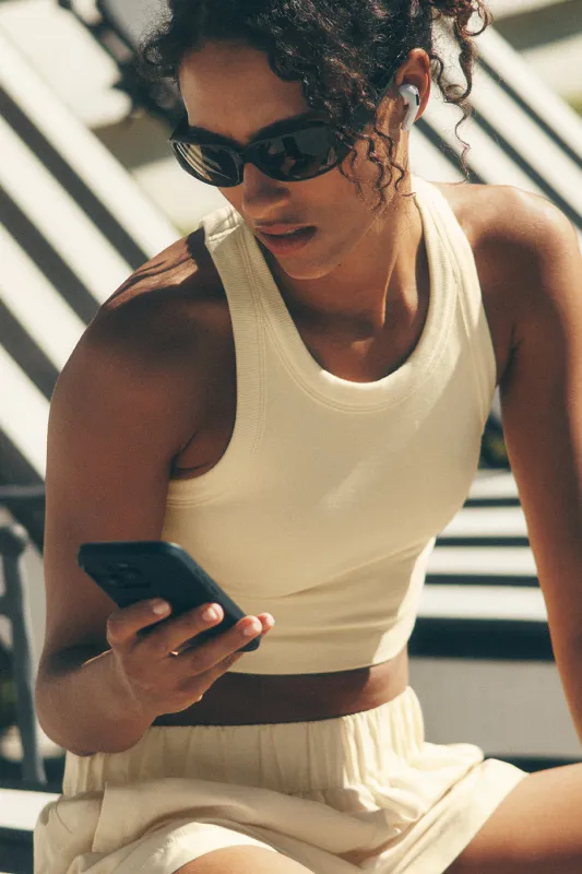 Seamless Delight High Neck Bra - Candlelight Yellow made by Alo Yoga