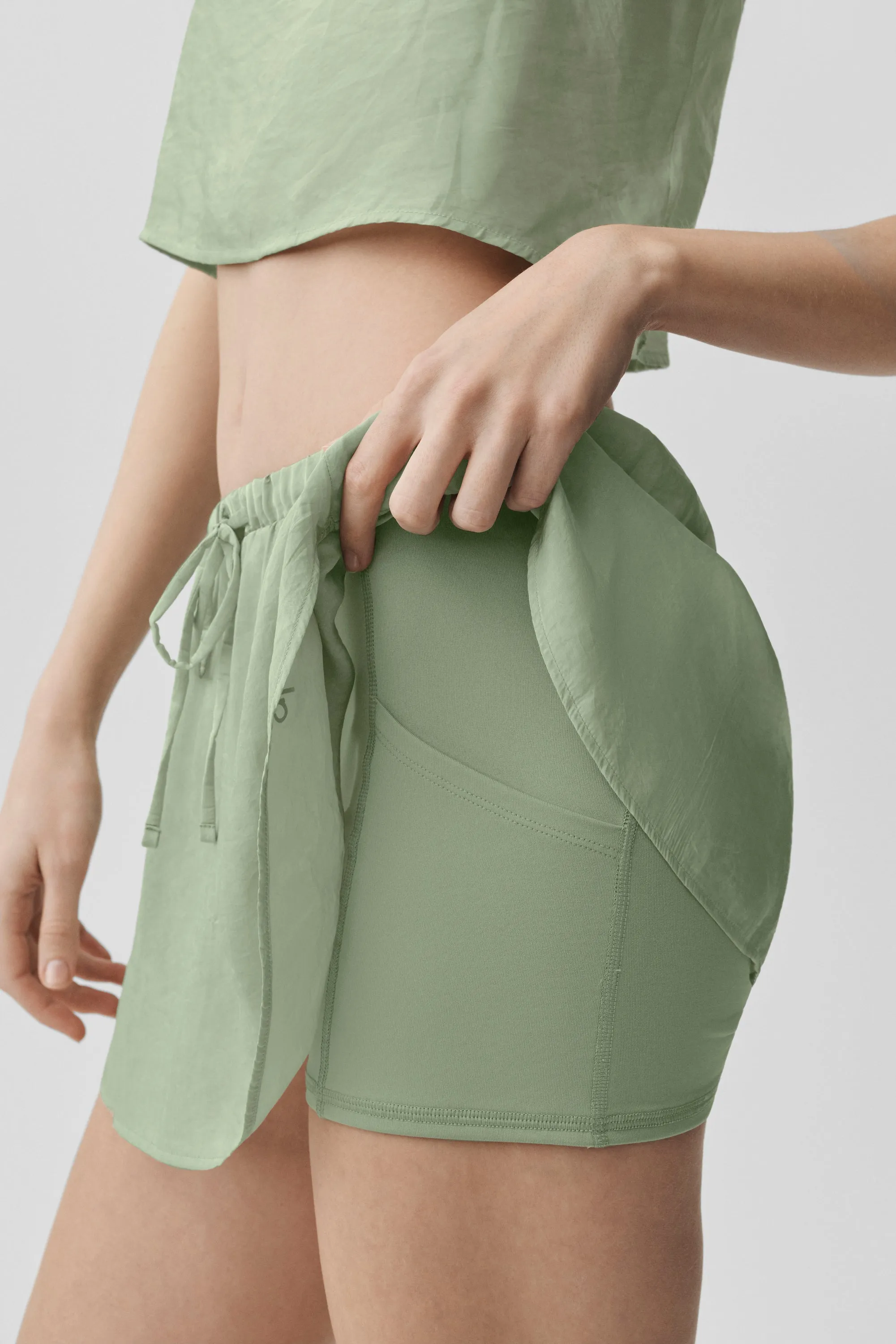Semi-Sheer Golden Hour Tennis Skirt - Dune Grass sold by Alo Yoga product image thumbnail 2