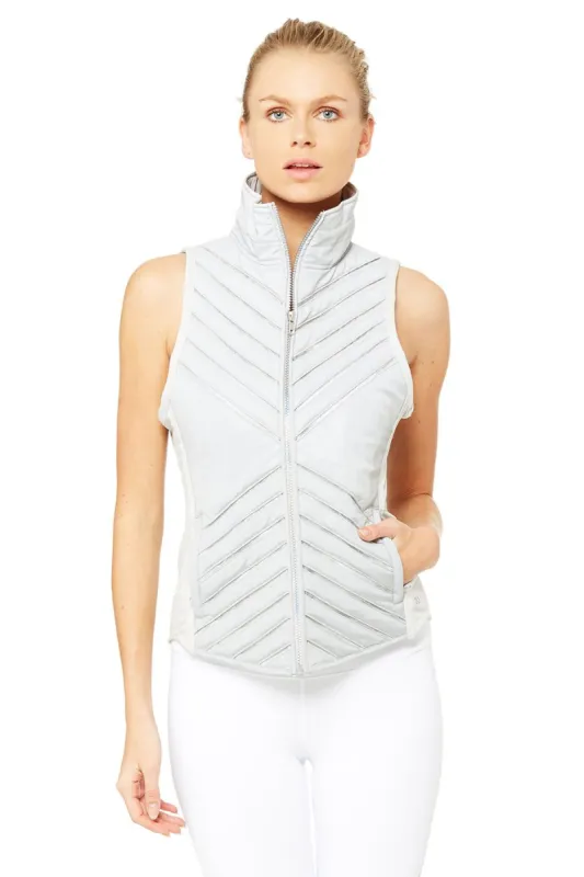 Reflective Puffer Vest - Silver Reflective sold by Alo Yoga