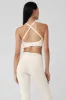 Seamless Ribbed Low Back Bra - Ivory sold by Alo Yoga