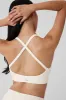 Seamless Ribbed Low Back Bra - Ivory sold by Alo Yoga