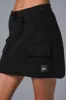 Scholar Knit Cargo Skirt - Black sold by Alo Yoga