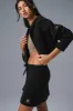 Scholar Knit Cargo Skirt - Black sold by Alo Yoga