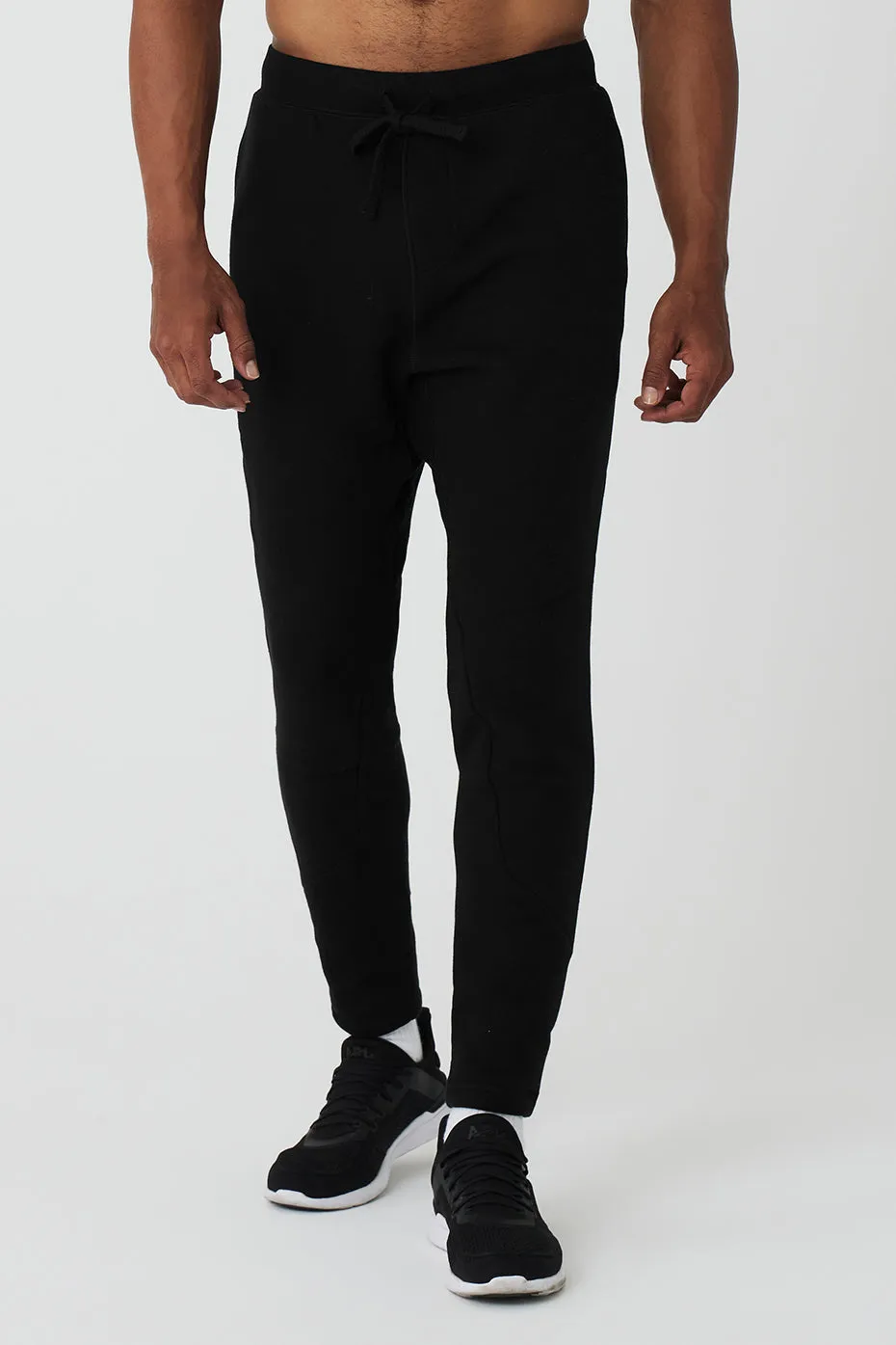 The Triumph Sweatpant - Black sold by Alo Yoga
