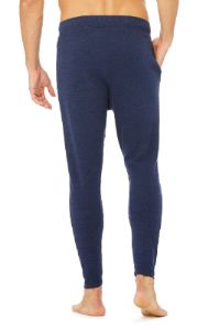 The Triumph Sweatpant - Solid Navy Triblend sold by Alo Yoga
