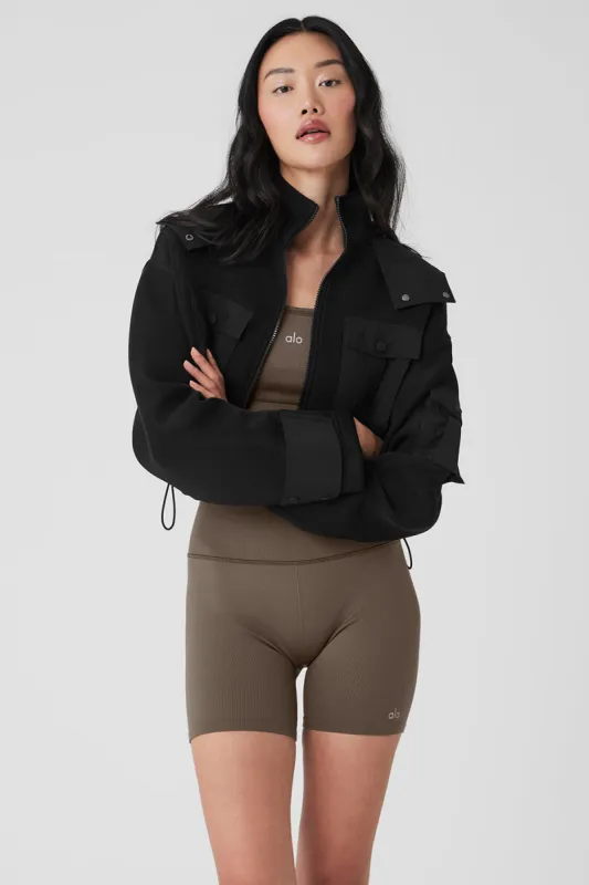 Cropped Engage Cargo Parka - Black sold by Alo Yoga