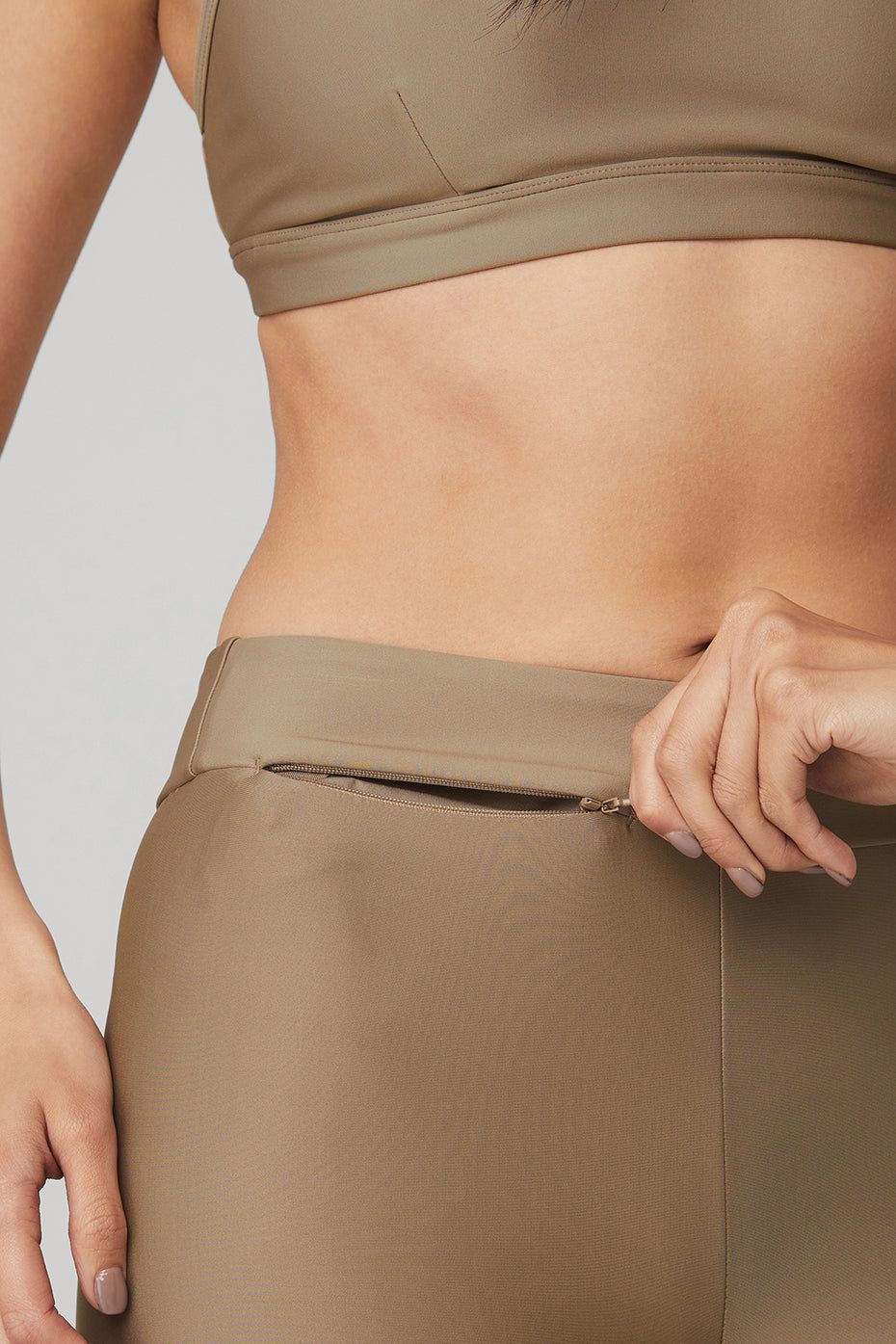 Airlift Intrigue Bra & Airlift High-Waist Conceal-Zip Capri Set - Gravel sold by Alo Yoga product image thumbnail 4