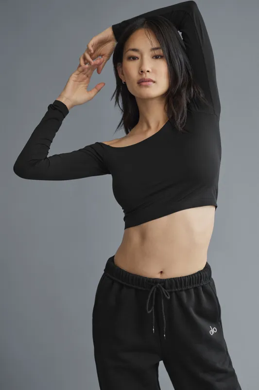 Asymmetric Sheer Glow Long Sleeve - Black sold by Alo Yoga