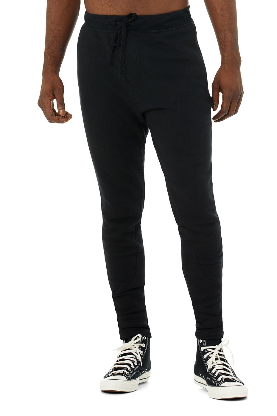 The Triumph Sweatpant - Solid Black Triblend sold by Alo Yoga