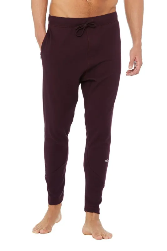 The Triumph Sweatpant - Ox Blood Triblend sold by Alo Yoga