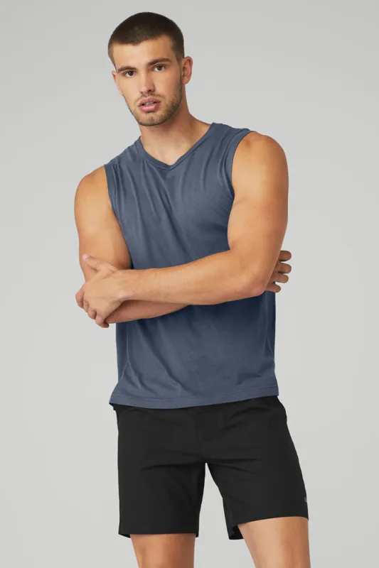 The Triumph Muscle Tank - Bluestone sold by Alo Yoga
