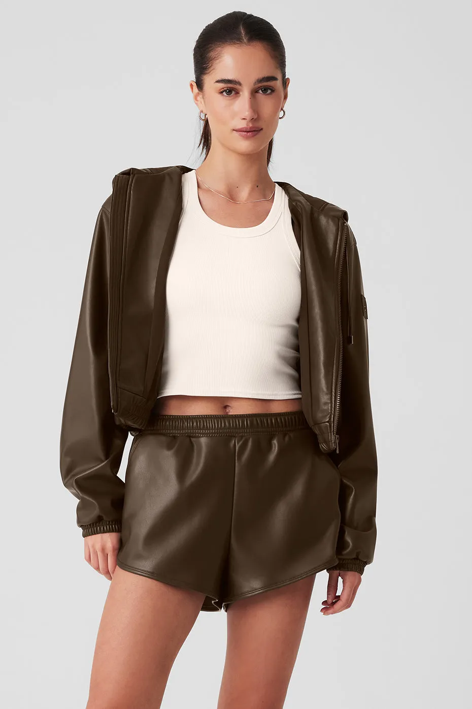 Faux Leather Power Hour Full Zip Cropped Jacket - Espresso sold by Alo Yoga