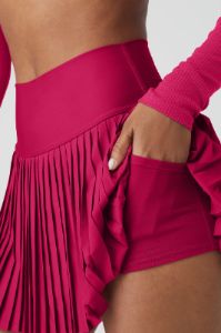 Grand Slam Tennis Skirt - Magenta Crush sold by Alo Yoga