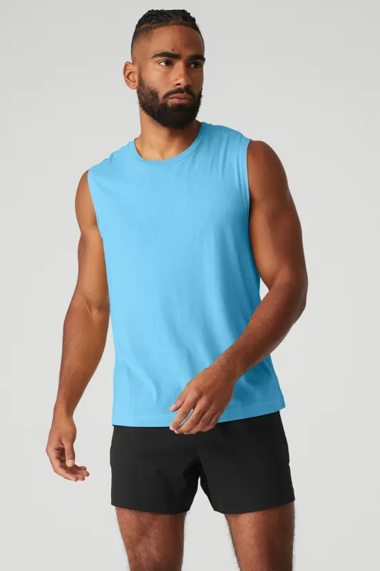 The Triumph Muscle Tank - Azure Blue sold by Alo Yoga