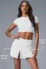 Alosoft Backspin Skirt - White sold by Alo Yoga