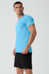 The Triumph Crew Neck Tee - Azure Blue sold by Alo Yoga