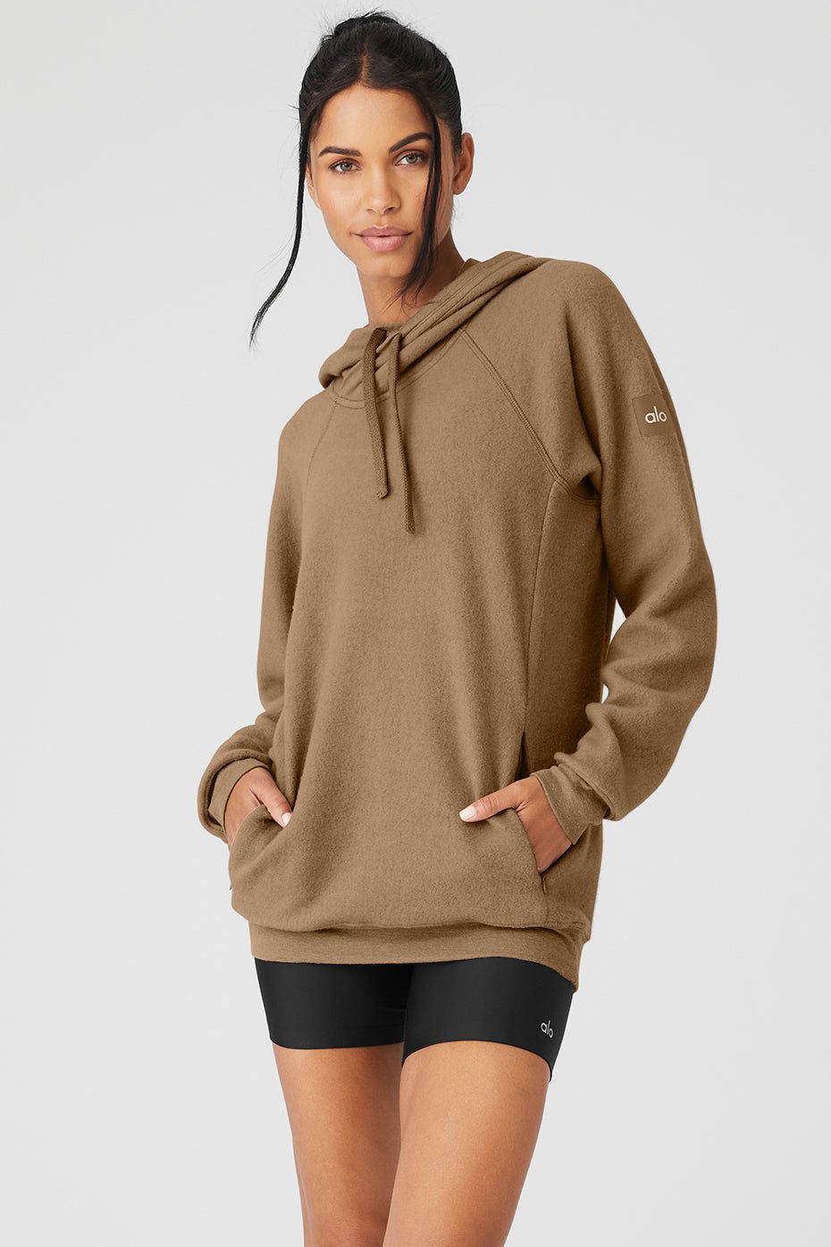 The Triumph Hoodie - Gravel sold by Alo Yoga