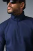 Conquer 1/4 Zip Reform Long Sleeve - Navy sold by Alo Yoga
