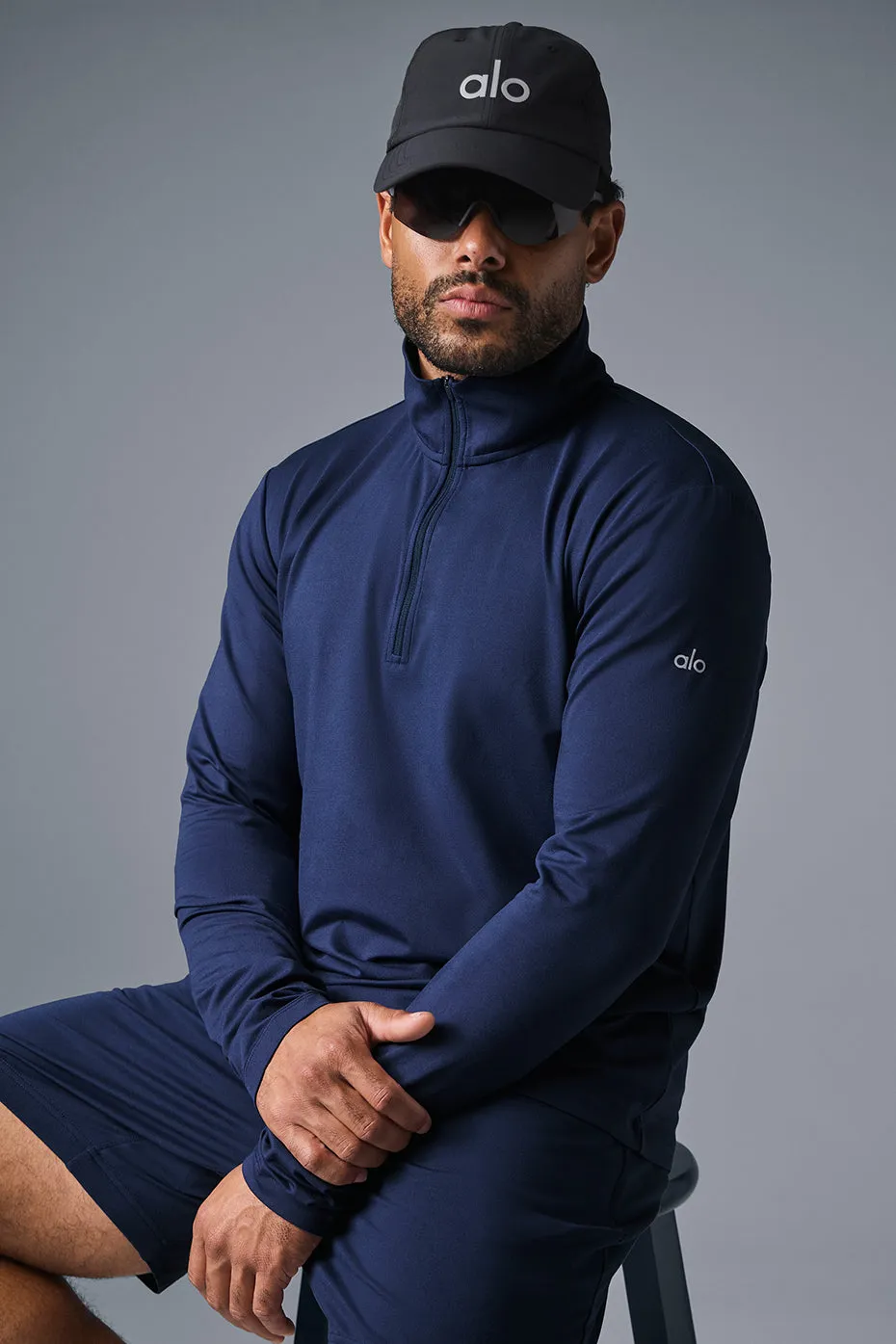 Conquer 1/4 Zip Reform Long Sleeve - Navy sold by Alo Yoga