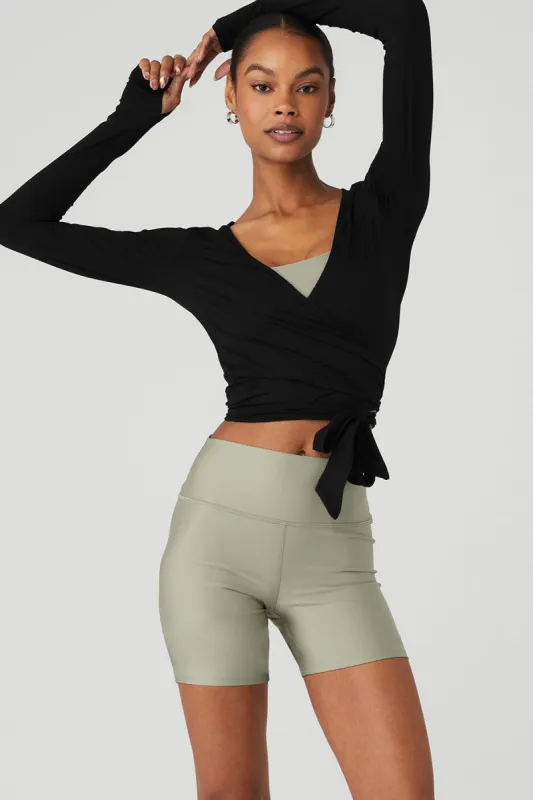 Cropped Escalate Wrap Top - Black sold by Alo Yoga