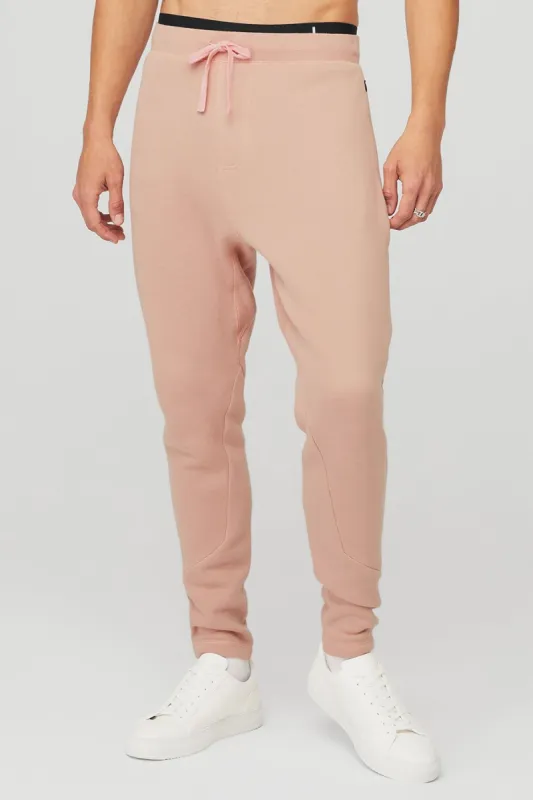The Triumph Sweatpant - Soft Clay sold by Alo Yoga