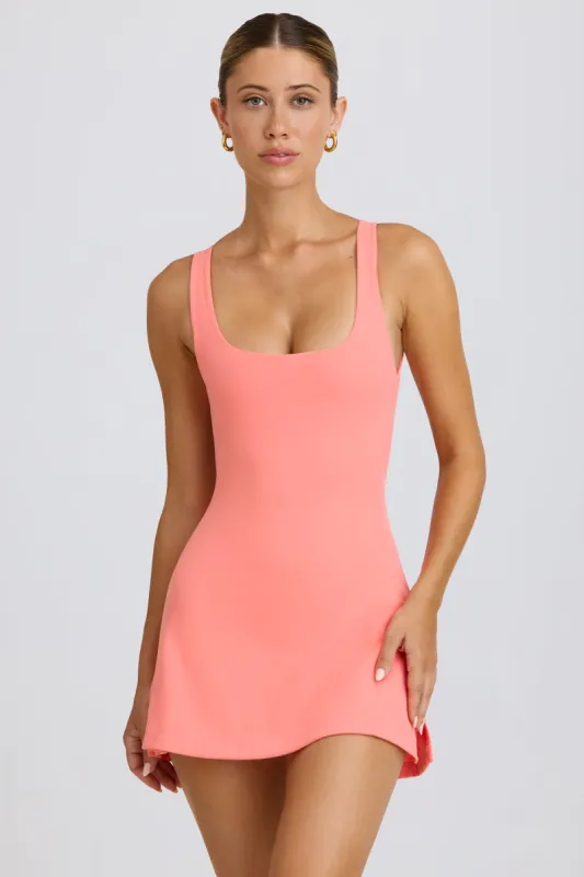 Soft Active Open-Back Tennis Dress in Coral sold by Bo + Tee
