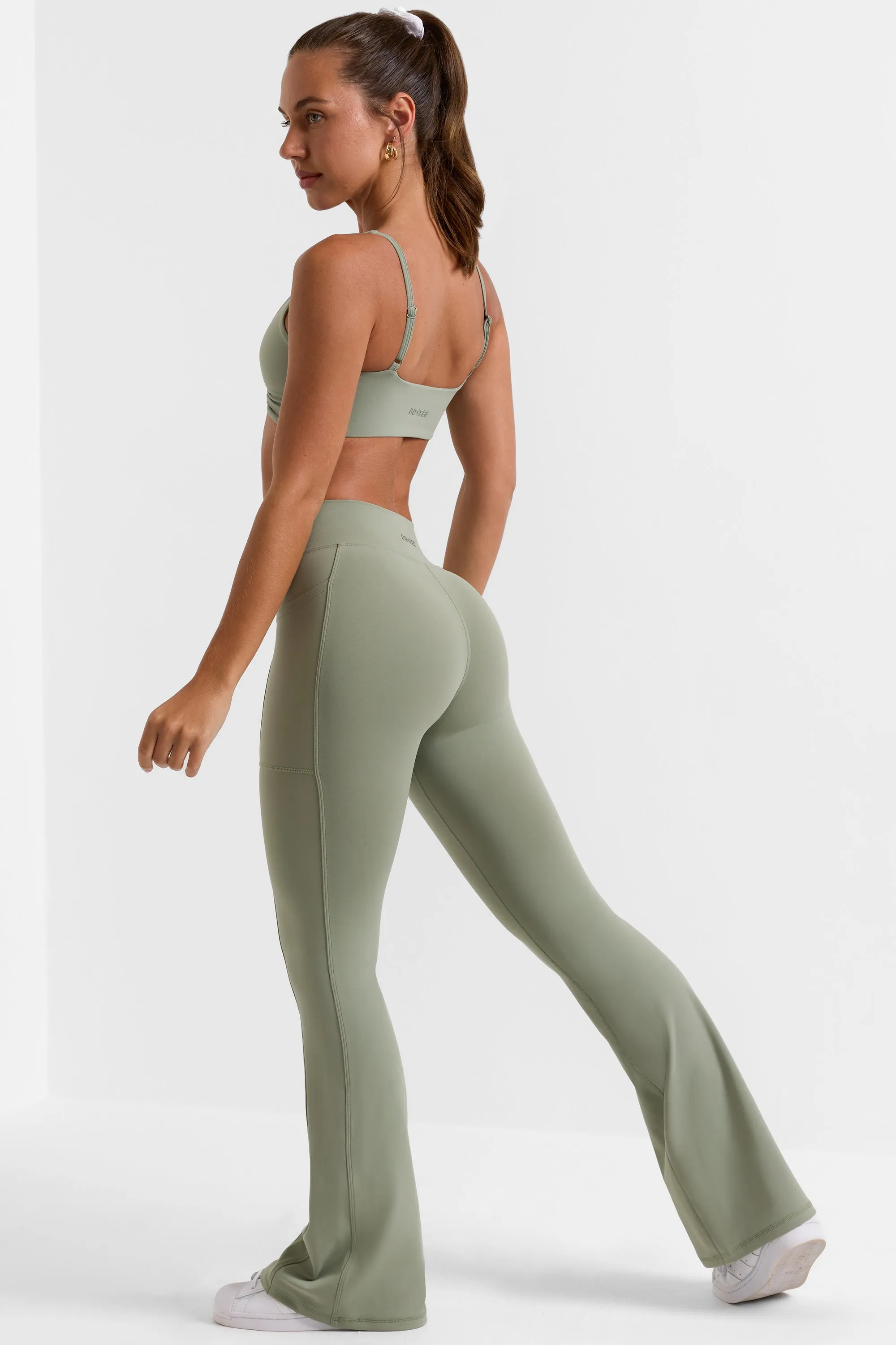 Match - Petite Cross Waistband Flare Pocket Leggings in Bamboo Green sold by Bo + Tee product image thumbnail 2