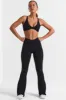 Match - Petite Cross Waistband Flare Pocket Leggings in Black sold by Bo + Tee