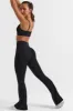 Match - Petite Cross Waistband Flare Pocket Leggings in Black sold by Bo + Tee
