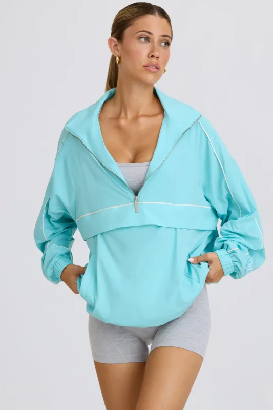 Oversized Track Jacket in Aqua sold by Bo + Tee