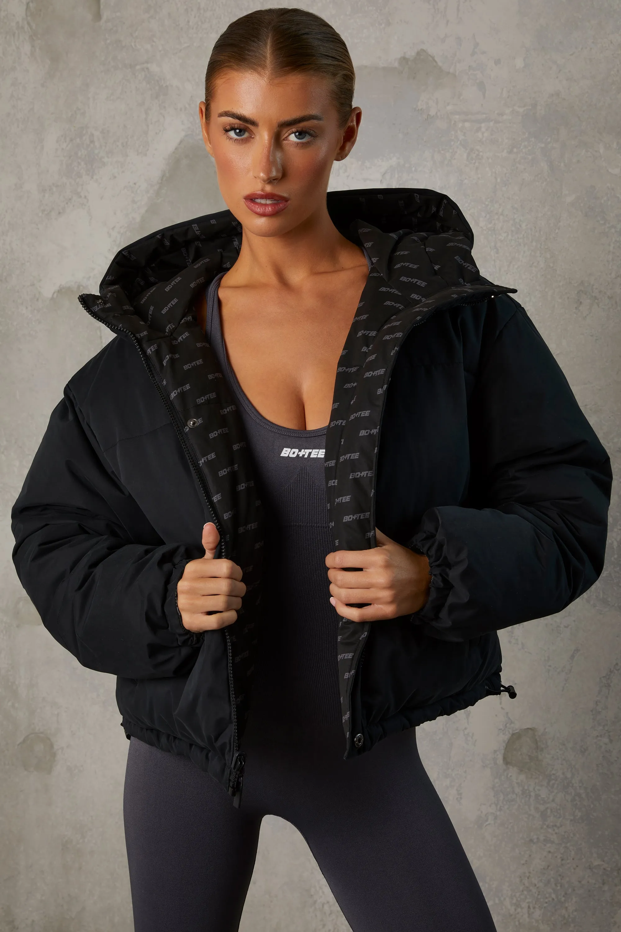 Reversible Hooded Puffer Jacket in Black sold by Bo + Tee product image thumbnail 4