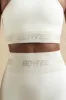 Knockout - Seamless Racerback Crop Top in Cream sold by Bo + Tee