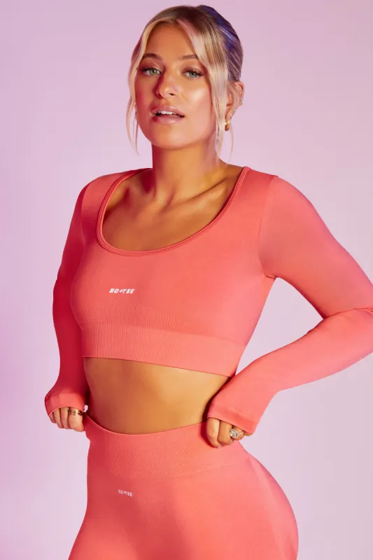 Reignited - Seamless Long Sleeve Crop Top in Coral sold by Bo + Tee