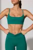 Adjust - Twist Back Scoop Neck Sports Bra in Teal Green sold by Bo + Tee