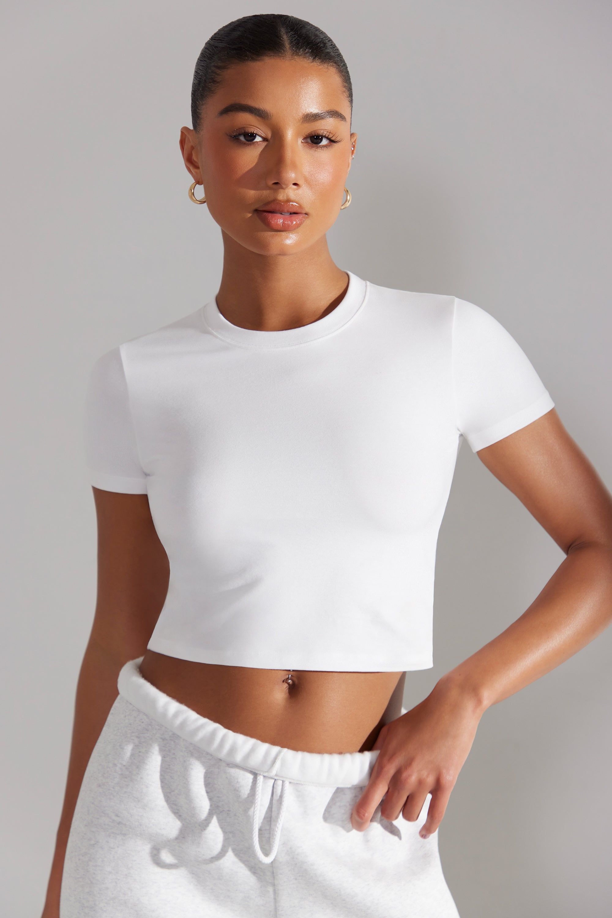 Essence - Cap Sleeve Baby Tee in White sold by Bo + Tee