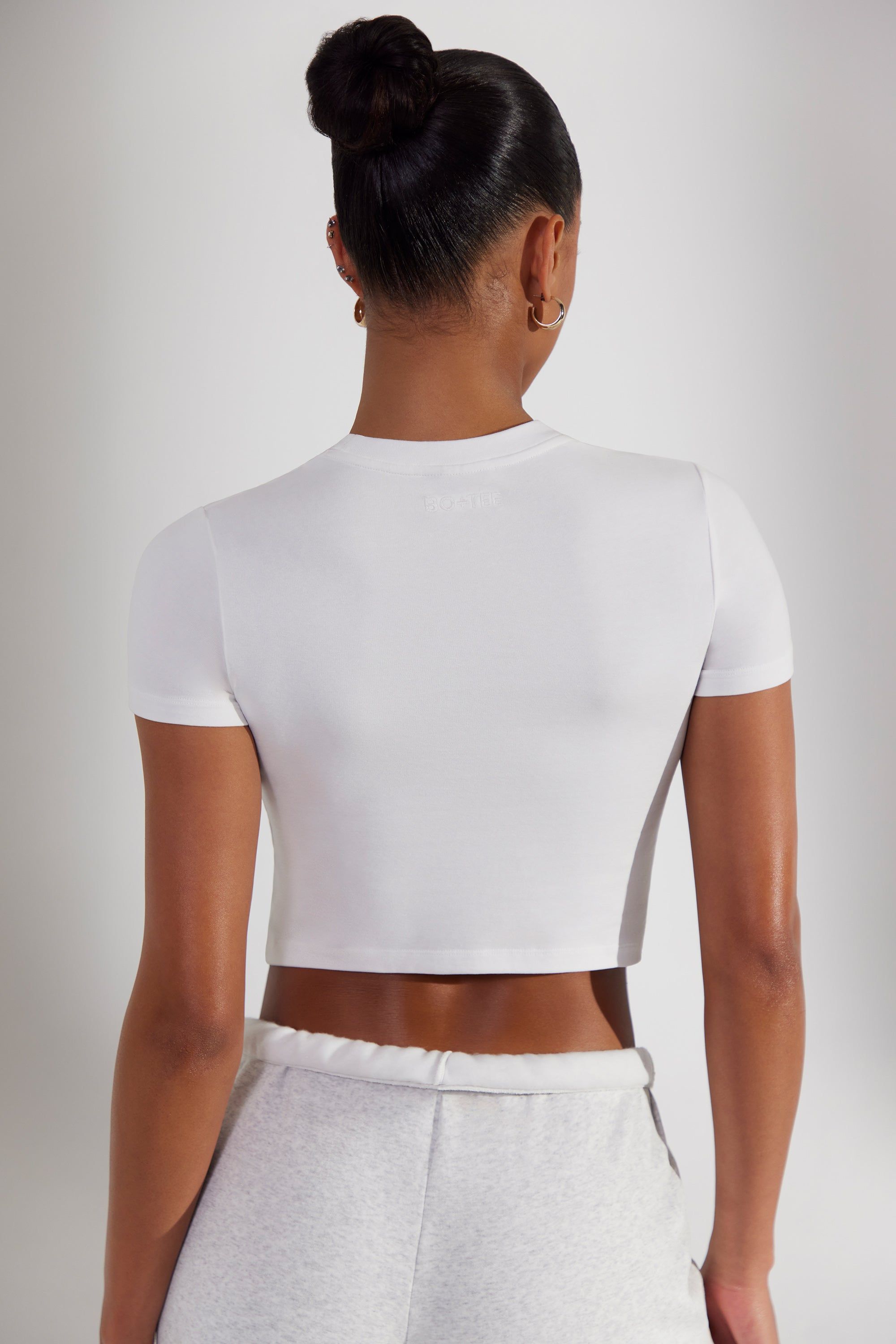 Essence - Cap Sleeve Baby Tee in White sold by Bo + Tee product image thumbnail 3