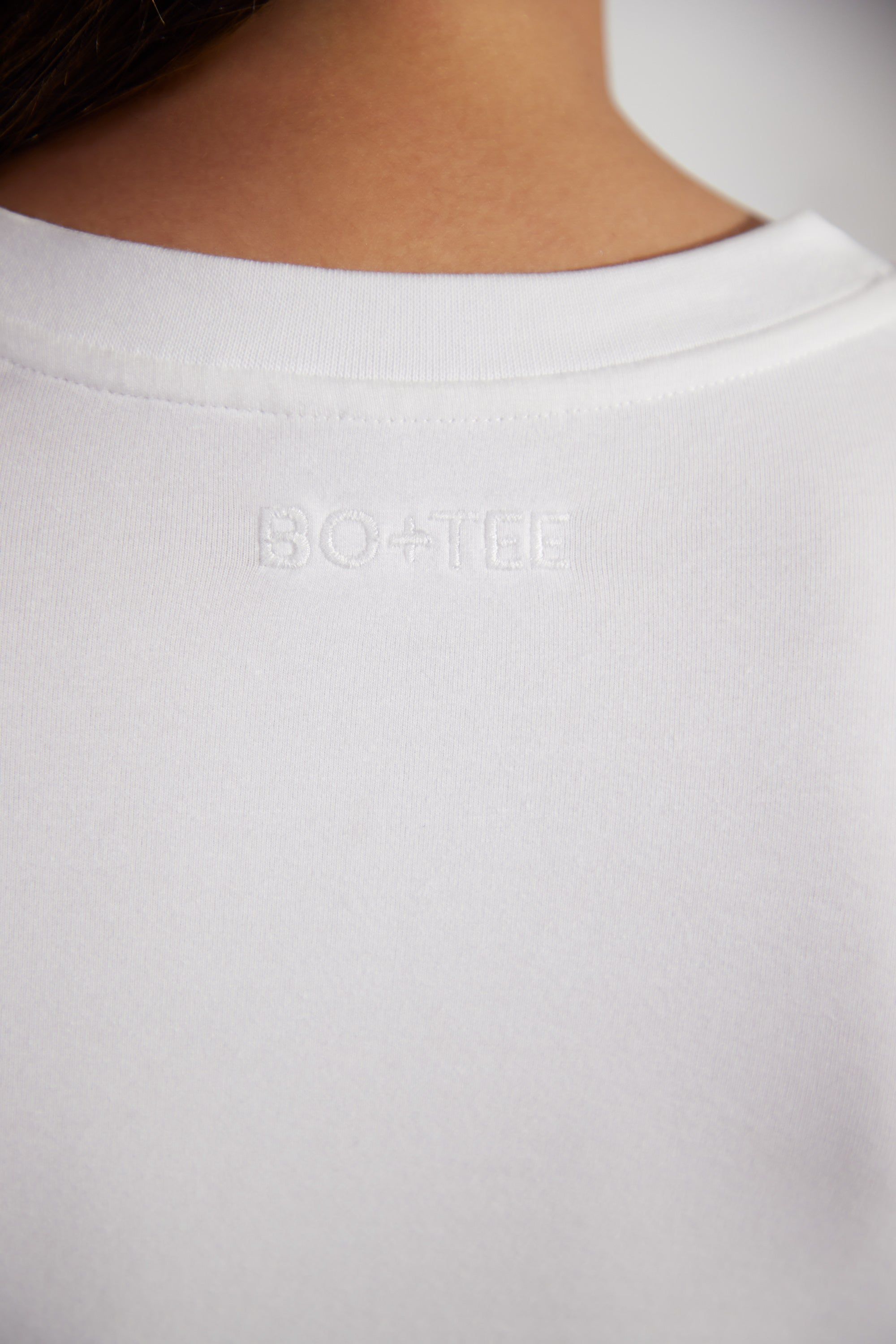 Essence - Cap Sleeve Baby Tee in White sold by Bo + Tee product image thumbnail 4