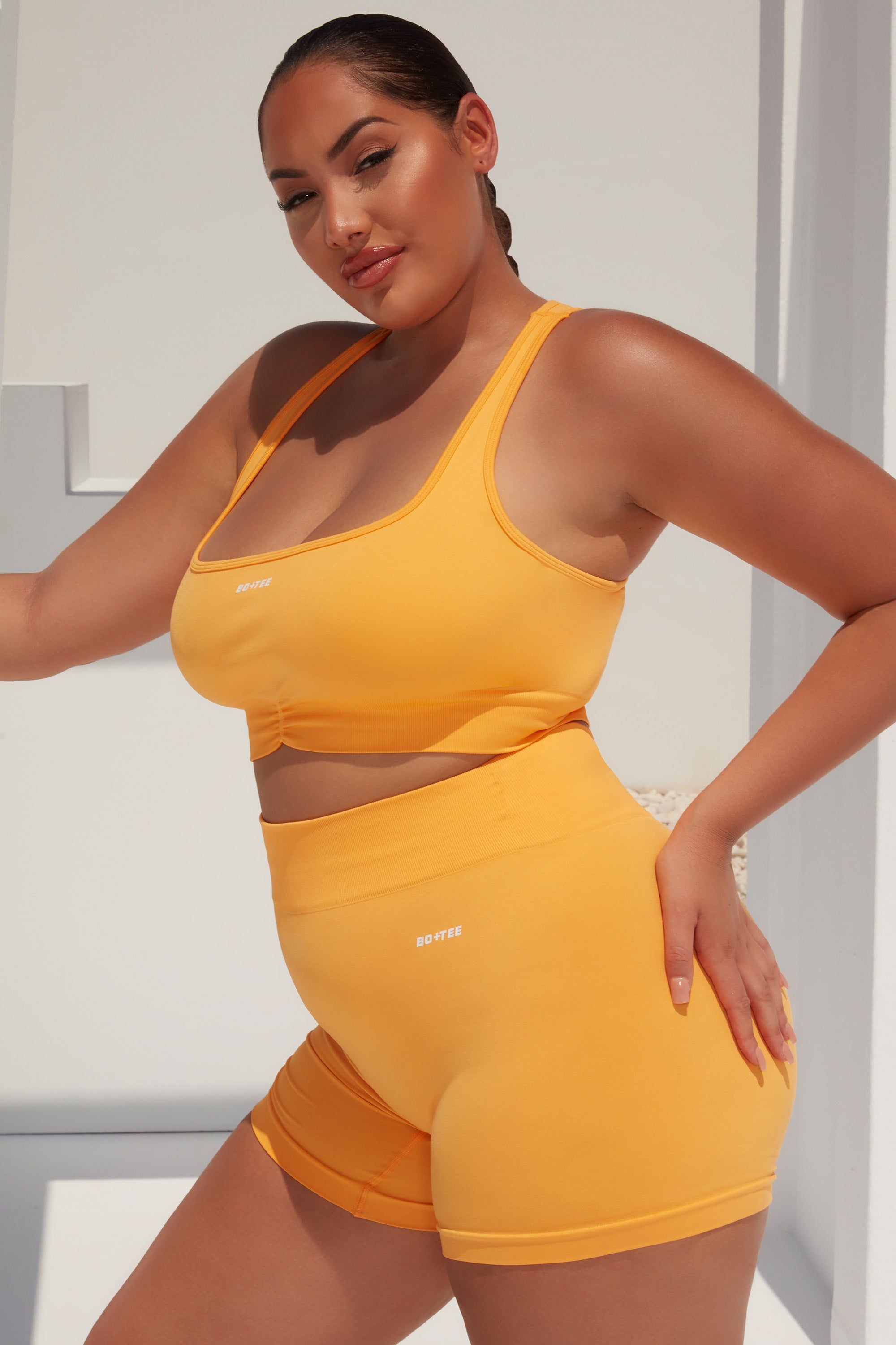 Radiate - Sports Bra in Light Orange sold by Bo + Tee product image thumbnail 2
